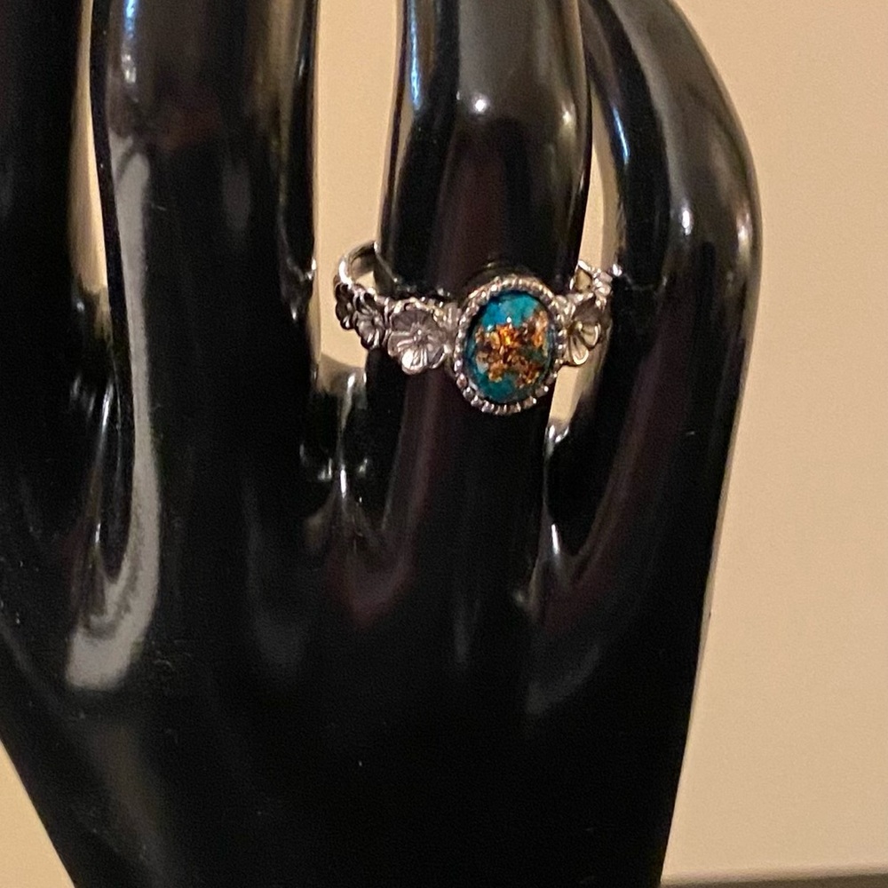Silver ring with blue green stone with gold